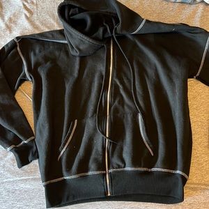 black zip up hoodie with white stitching
